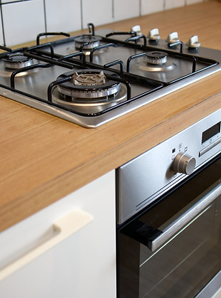 vecteezy_mock-up-gas-stove-in-the-minimal-style-kitchen-with-white_24255403.jpg