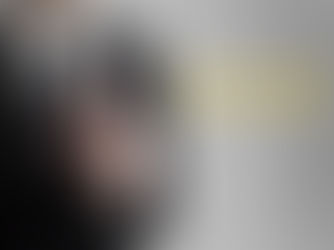 A customer pushing a button for a five-star rating.