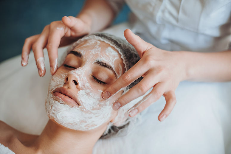 closeup-portrait-cosmetologists-hands-applying-mask-clients-face-spa-salon-natural-beauty-