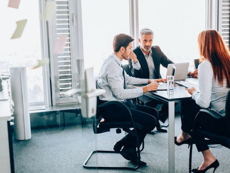 Executive board meeting with three members