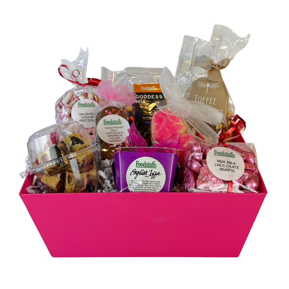 Valentine’s Day Gift Basket with chocolates, cookies, Monster Bites, and gourmet snacks in a pink basket