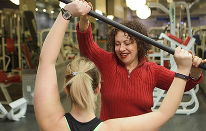 Katya Shubova DPT, an experience physical therapist in Soho, treating a back & shoulder injury