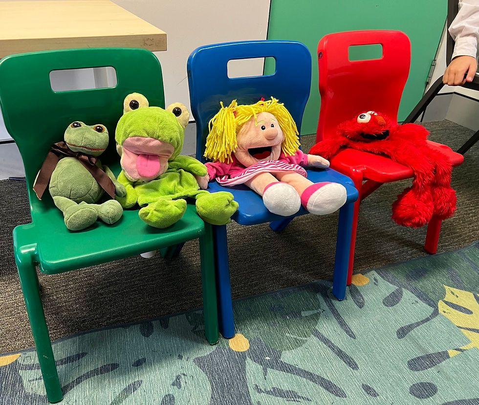 Picture of puppets on a chair at Leap Therapy Group
