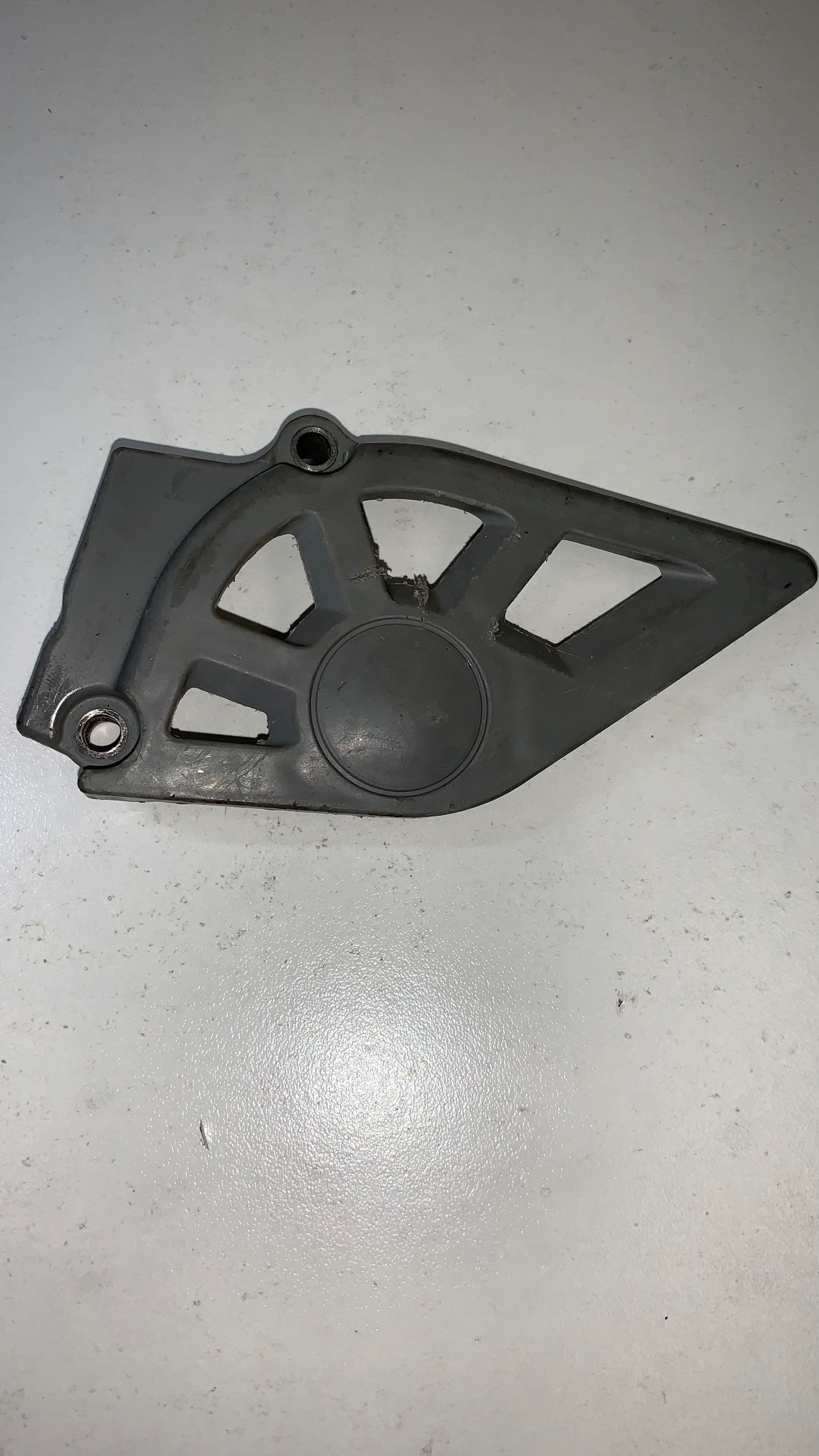 Honda :protection pignon 250 crf 06