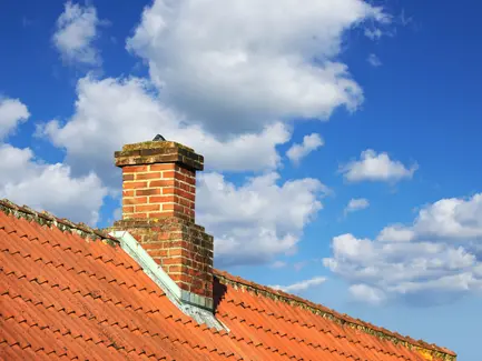 brick chimney in a cloudy