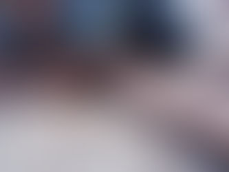 male hands repairing sports ground cutting in the roof