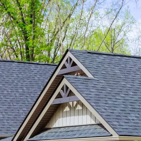 Roofing shingles cover roof of a newly constructed house