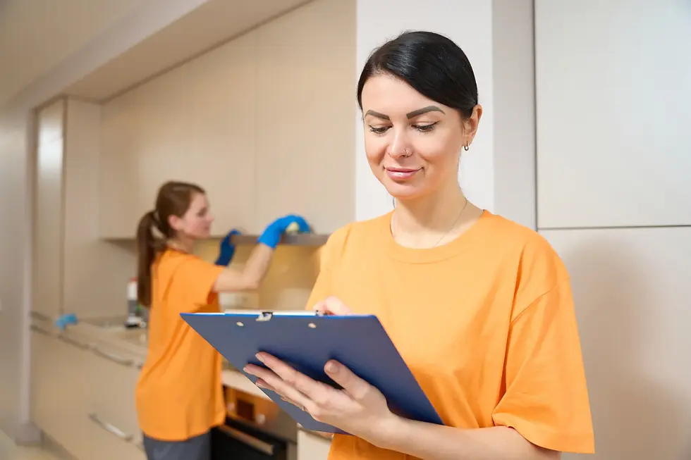 women from cleaning company working in apartment