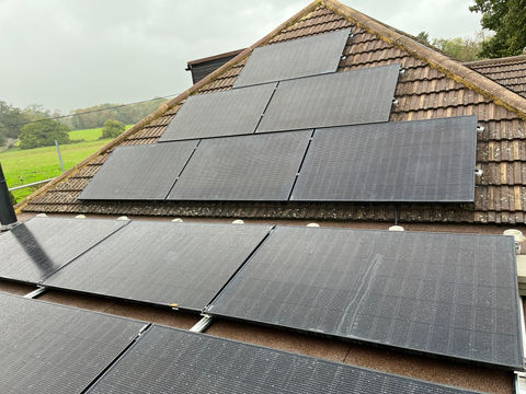 Pitched and flat roof solar pv installation completed by Dorset Solar Solutions. 