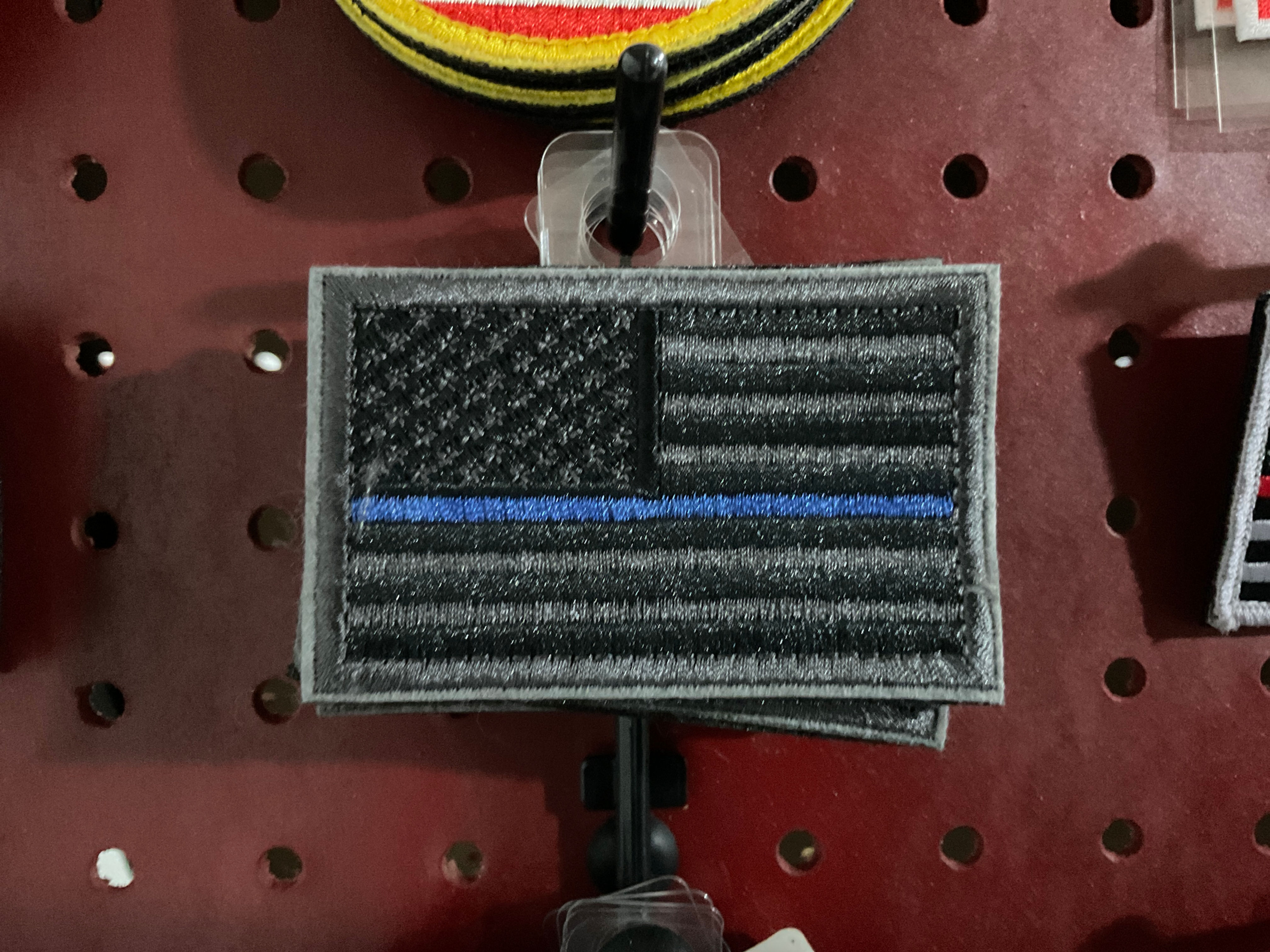 American flag (black and silver with blue line)