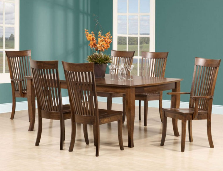 Cardinal Woodcraft Colonial Vienna Dining Set in room with table and chairs in brown stain