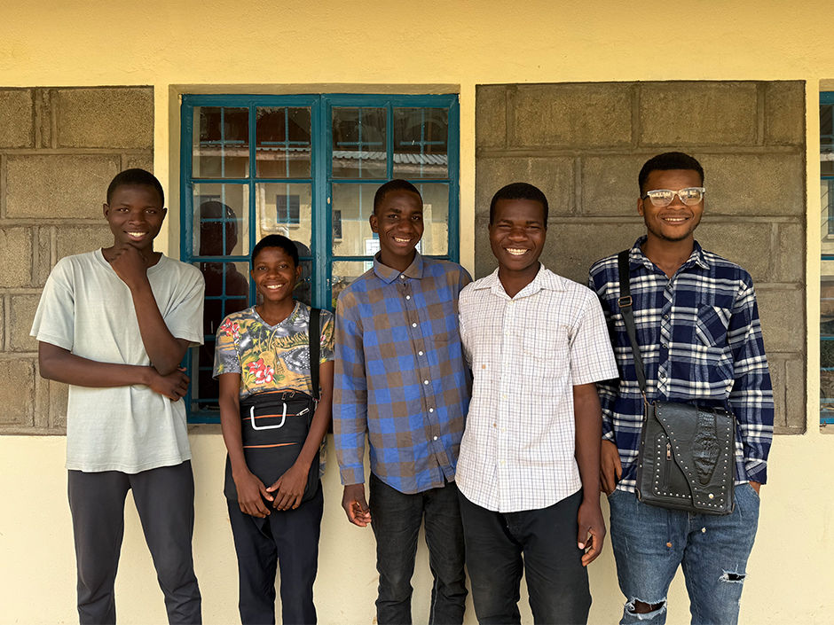 Lonjezo, second left, pictured with our 2025 students.