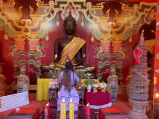 Fans react as Ini Edo visits Big Buddha Temple in Thailand, prays for Nigeria