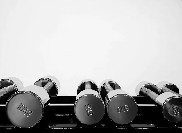 close-up-dumbbells-gym_53876-139915.webp