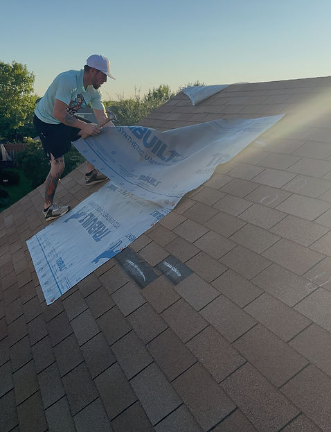 Rich The Roofer installing tarpsmon roof in forney texas.JPEG