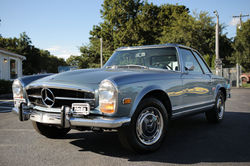 Pale green Mercedes-Benz W113 Pagoda SL with hardtop at Angels Touch Restoration.
