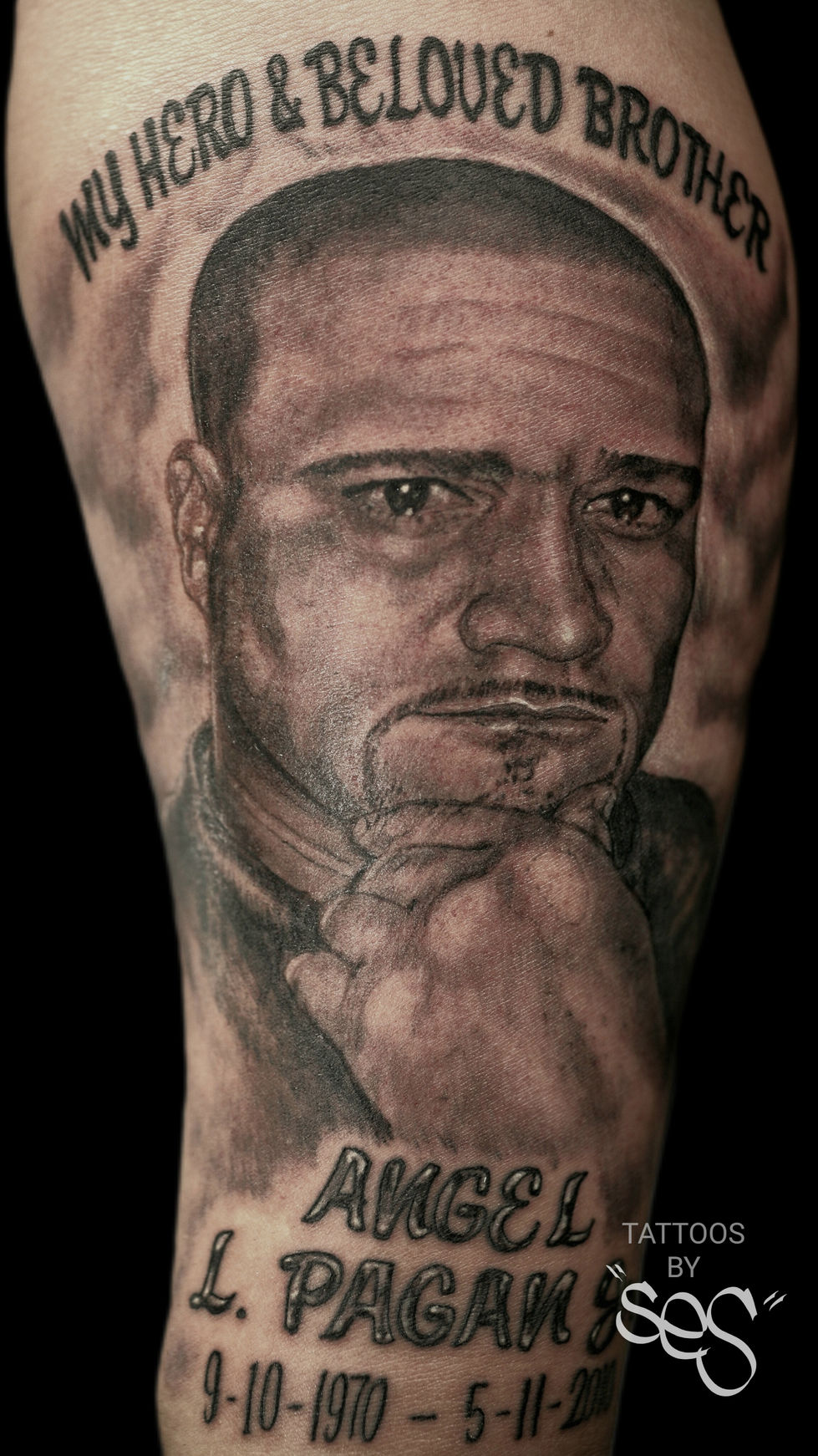 a black and grey portrait tattoo with lettering memorial by Ses Blackwork Tattoo Studio Little Falls NJ