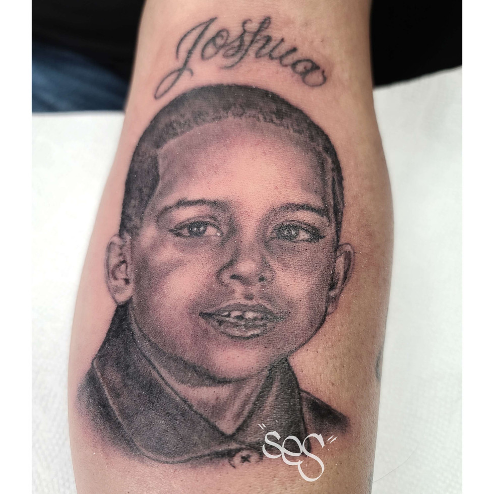 black and grey portrait of a little boy by Ses