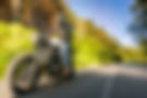man-riding-motorcycle-road.jpg