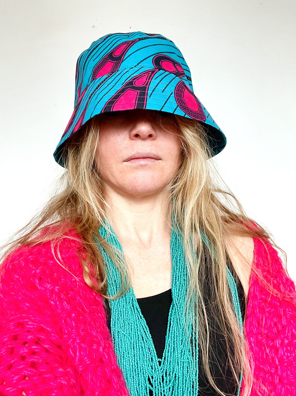 Colourful handmade bucket hat made with genuine African wax print fabric.