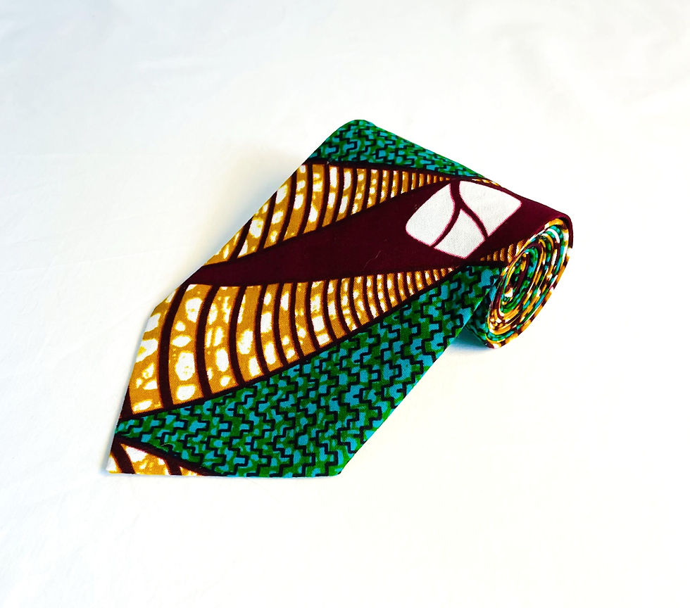 Handmade African wax print tie in teal, mustard and maroon.
