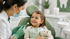 Toddler having a gentle first dental check-up