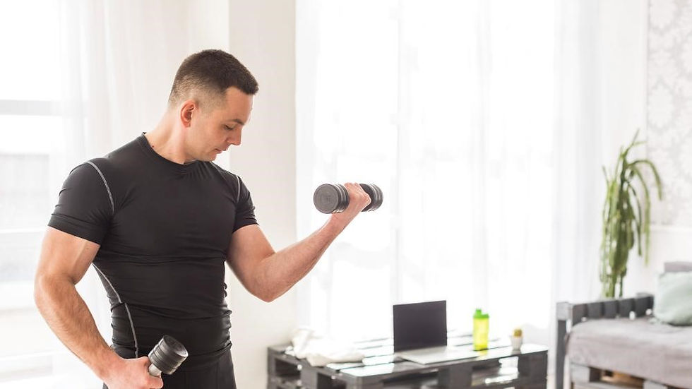 A Fit guy in black outfit doing Dumbbells at home