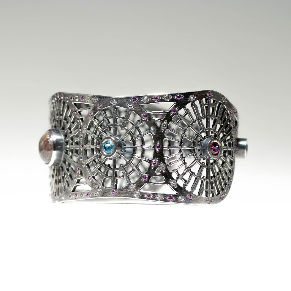 Thumbnail: cuff Tourmalated Quartz Topaz garnet saw pierced hand engraved tom asquith jewellery