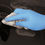 Thumbnail: Shield GD19 Blue nitrile glove wiping a surface