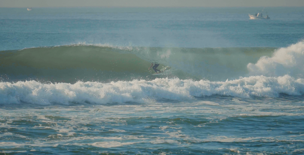 surfer in the barrel
