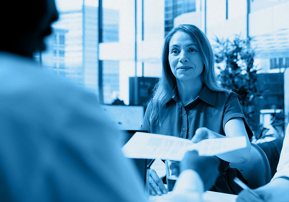 upbeat-recruiter-doing-interview-with-businessman-1.jpg