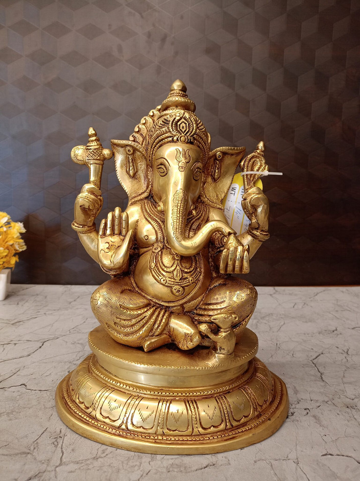 Brass Ganesha Sitting On Round Base