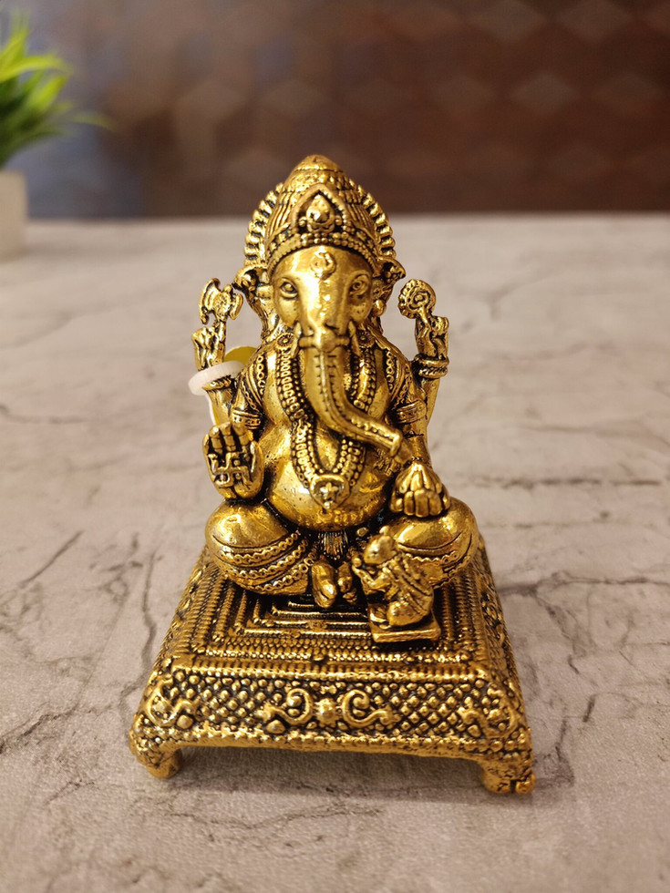 Brass Ganesha Idol Sitting On Chowki Stand
