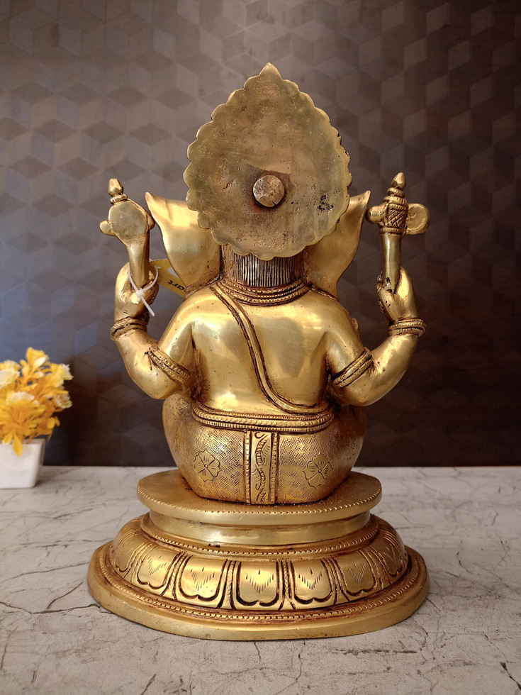 Brass Ganesha Sitting On Round Base