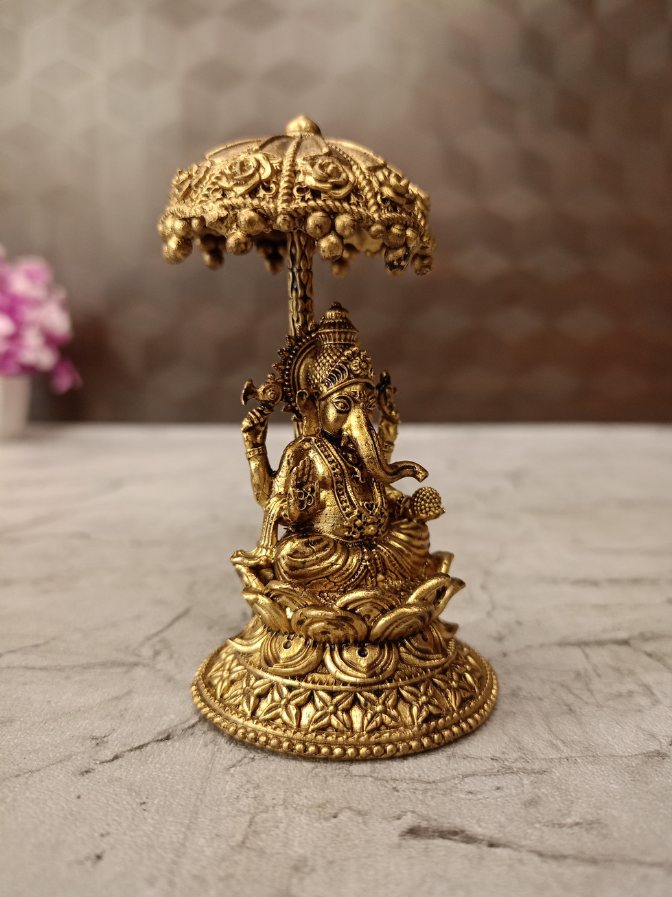 Brass Fine art Ganesh with an Umbrella