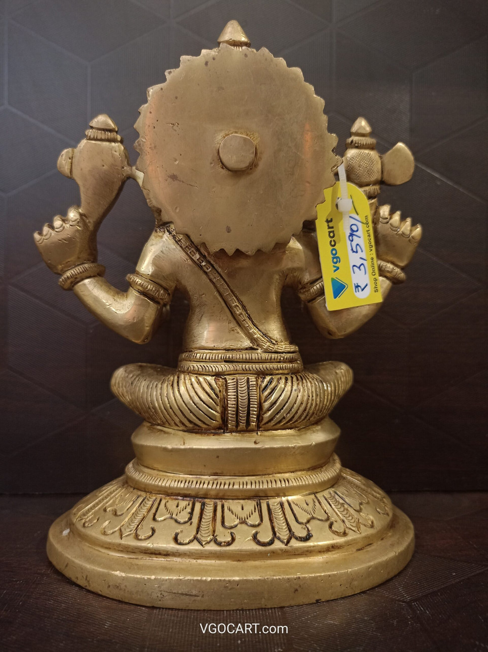 Brass Ganesha Sitting On Oval Base