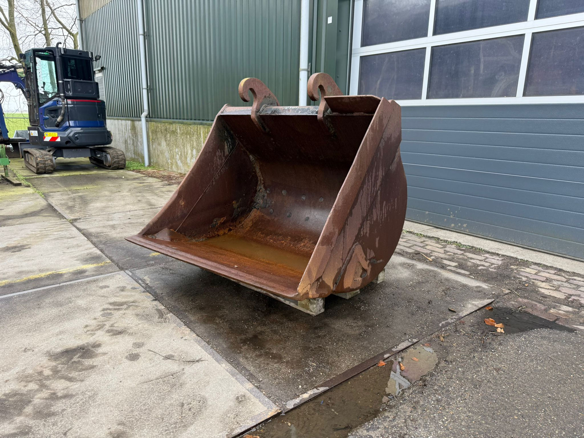 Pladdet digging bucket