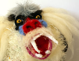creative crochet sculpture, contemprary textile sculpture, textile baboon