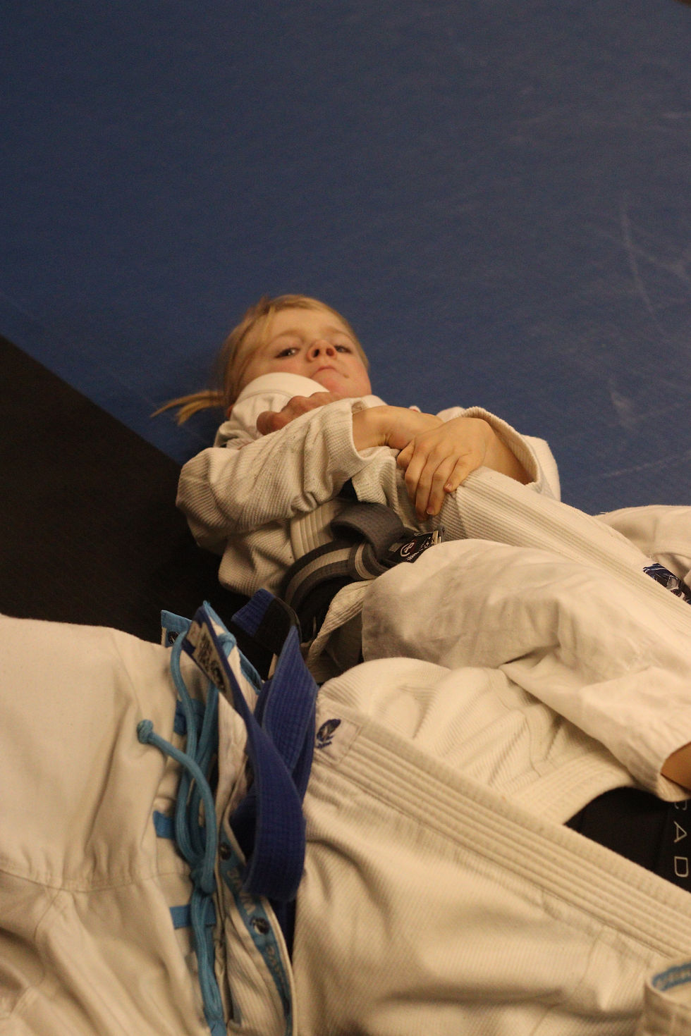 A Child applying a Jiujitsu Armbar in Bantry 4Honor Gym