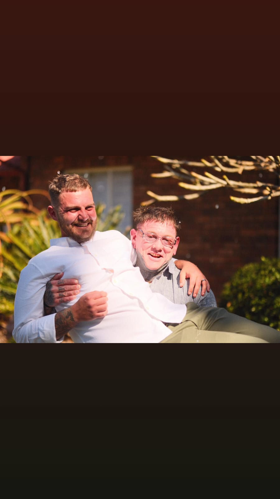 Morgan so excited for his brother that he had to lift him up - no mean feat!