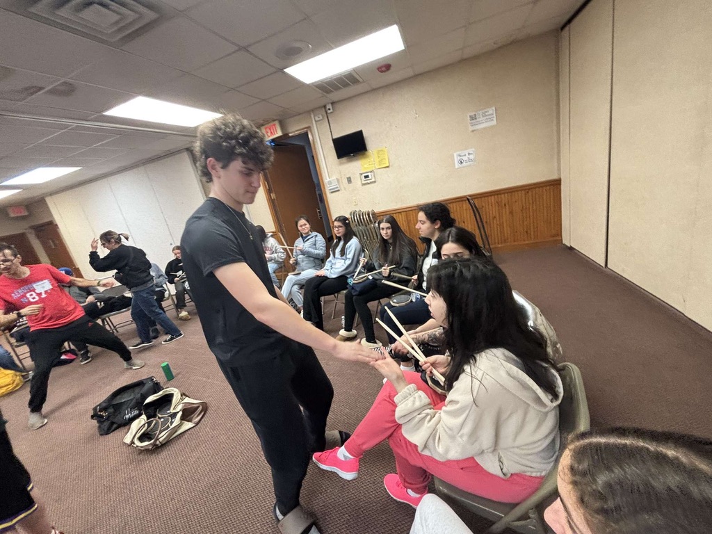 Unique Melodies participants making music together