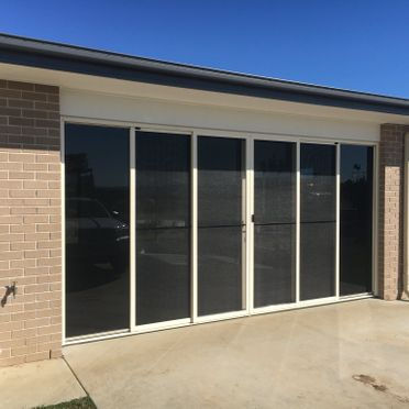 gavs glass converted garage doors into sliding door and screens