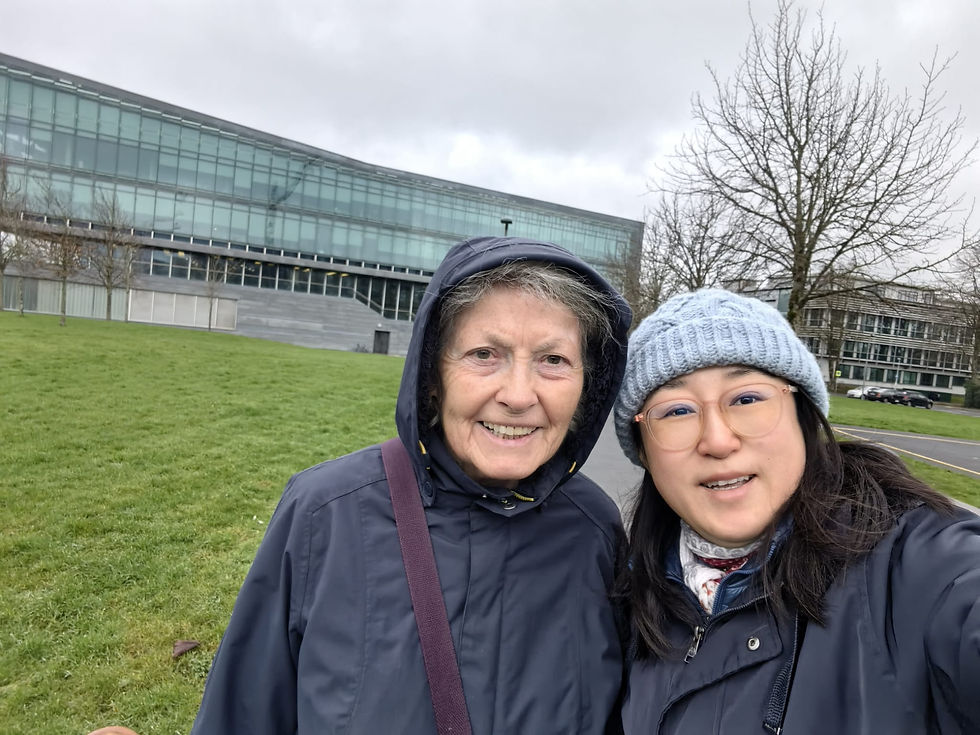 Older woman and her live-in home share companion smiling outdoors in Galway, showing the friendship and companionship created through Elder Home Share Ireland.