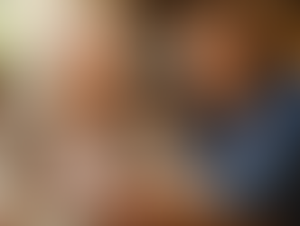 Adult daughter having a gentle conversation about homeshare with her elderly mother at home