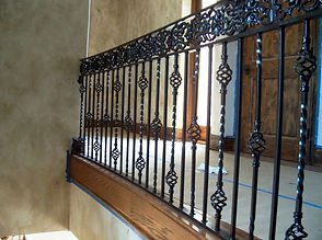 de67120b798e4d9c05ac06d24d8b6570--wrought-iron-stair-railing-staircase-handrail.jpg