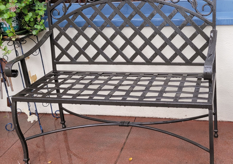 iron fabricated bench with cress cross pattern in Santa Barbara iron contractor high end ironwork