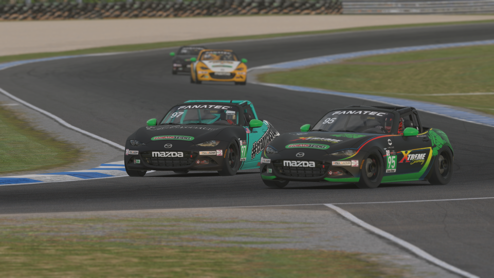Lap 19 #95 Rudduck & #97 Cranston Battle into the.png