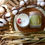 Miniature : bougie végétale fleur de coton 150gr, contenant verre, photo ambiance deco floral et rotin