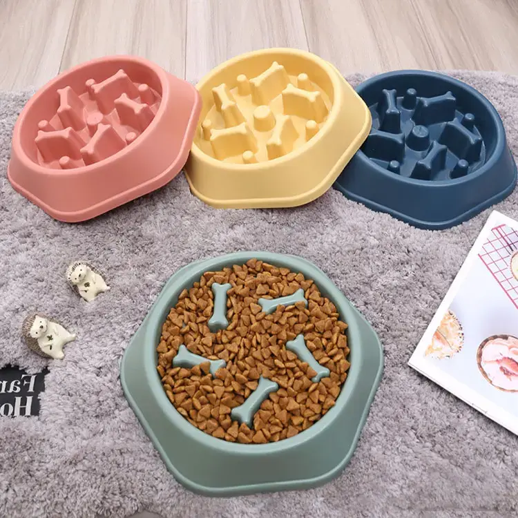 Thumbnail: Picture of 4 slow eater bowls bone pattern one with food in it
