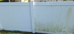 Power washed fence clean